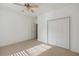 Bedroom showcasing double closet doors and neutral carpeting at 1409 Endicot Way, Mount Pleasant, SC 29466