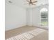 Bedroom featuring a ceiling fan and ample natural light from a large window at 1409 Endicot Way, Mount Pleasant, SC 29466