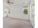 Spacious bedroom featuring neutral carpet, bright white walls, and multiple windows for natural light at 1409 Endicot Way, Mount Pleasant, SC 29466
