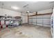 Spacious two car garage with storage shelves and an automatic door opener at 1409 Endicot Way, Mount Pleasant, SC 29466