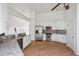 Bright, open kitchen with stainless steel appliances, granite countertops, and hardwood floors at 1409 Endicot Way, Mount Pleasant, SC 29466