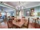Cozy dining room adjacent to living area with hardwood floors at 1417 Pine Island View, Mount Pleasant, SC 29464