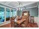 Elegant dining room with hardwood floors and a vintage hutch at 1417 Pine Island View, Mount Pleasant, SC 29464