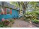 Charming home exterior with brick pathway and beautiful landscaping, creating a welcoming entrance at 1417 Pine Island View, Mount Pleasant, SC 29464