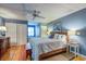Spacious main bedroom offering hardwood floors, a window seat, and soft natural light from the window at 1417 Pine Island View, Mount Pleasant, SC 29464