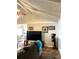 Comfortable living room featuring vaulted ceilings and warm wood-look flooring at 142 Aylesbury Rd, Goose Creek, SC 29445