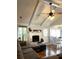 Comfortable living room featuring a fireplace, ceiling fan, and hardwood style flooring at 142 Aylesbury Rd, Goose Creek, SC 29445