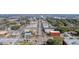A panoramic aerial view of commercial buildings, trees, and neighborhood streets with parked cars at 1450 E Montague Ave, North Charleston, SC 29405