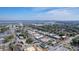 An aerial cityscape view showcasing rooftops, buildings, and lush green trees at 1450 E Montague Ave, North Charleston, SC 29405