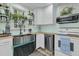 Contemporary kitchen boasting stainless steel appliances, custom cabinets, and a clean, modern design at 1450 E Montague Ave, North Charleston, SC 29405