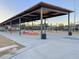 A covered picnic area with tables and seating, ideal for outdoor gatherings and events at 1450 E Montague Ave, North Charleston, SC 29405