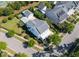 Overhead shot of a property featuring a manicured lawn, detached garage, and inviting pool area at 1526 Old Rivers Gate Rd, Mount Pleasant, SC 29466