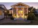 Inviting back porch area with steps and manicured landscaping in the evening at 1526 Old Rivers Gate Rd, Mount Pleasant, SC 29466