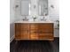 Bright bathroom featuring a double vanity, shiplap walls and herringbone tile floors at 1526 Old Rivers Gate Rd, Mount Pleasant, SC 29466