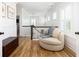 Upstairs hallway with hardwood floors, a comfortable chair, and lots of natural light at 1526 Old Rivers Gate Rd, Mount Pleasant, SC 29466