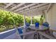 Relaxing outdoor seating area with a pergola and a garden view at 1526 Old Rivers Gate Rd, Mount Pleasant, SC 29466