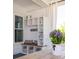 Porch nook offers a bench and storage at 1526 Old Rivers Gate Rd, Mount Pleasant, SC 29466