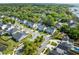 Aerial view of homes in community featuring a playground and sidewalks at 1562 Charming Nancy Rd, Charleston, SC 29412
