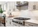 Close-up of a well-equipped kitchen with sleek stainless steel appliances and stylish white cabinetry at 1562 Charming Nancy Rd, Charleston, SC 29412