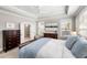 Spacious main bedroom with tray ceilings, lots of natural light, a walk-in closet, and an en-suite bathroom at 1562 Charming Nancy Rd, Charleston, SC 29412