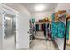 Spacious walk-in closet with ample shelving and hanging space for organization and convenience at 1562 Charming Nancy Rd, Charleston, SC 29412