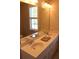 Bathroom vanity with double sinks and a large mirror, providing ample space and functionality at 1651 Indy Dr, North Charleston, SC 29405