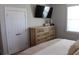 Bedroom with a large dresser and TV, offering a comfortable and functional living space at 1651 Indy Dr, North Charleston, SC 29405