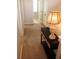 Hallway featuring a decorative console table with drawers and a unique lamp, adding character to the home at 1651 Indy Dr, North Charleston, SC 29405