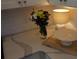 Close up of kitchen counter with flowers, lamp, and serving platter at 1651 Indy Dr, North Charleston, SC 29405