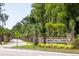 The entrance to Liberty Hill Farm showcases a tree-lined street and manicured landscaping at 1652 Siloh Ln # 474, Mount Pleasant, SC 29466