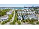 Aerial view of a neighborhood with tree-lined streets near a waterfront area at 1659 Pierce St, Daniel Island, SC 29492