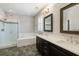 Elegant bathroom with double vanity, soaking tub, glass shower and stylish tile flooring at 1659 Pierce St, Daniel Island, SC 29492