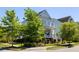 Charming two-story home with a classic porch and well-manicured landscaping at 1659 Pierce St, Daniel Island, SC 29492