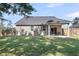 The home features a beautiful backyard with a covered patio, perfect for outdoor entertaining and relaxation at 171 Sara St, Saint George, SC 29477