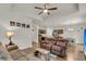 Open-concept living room with kitchen and dining area, perfect for entertaining at 171 Sara St, Saint George, SC 29477