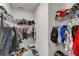 Spacious walk-in closet with ample storage racks, hanging rods and multiple rows of shoe storage at 171 Sara St, Saint George, SC 29477