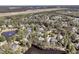 Neighborhood featuring mature trees, a pond, and proximity to an airport with a runway in the distance at 1828 S James Gregarie Rd, Mount Pleasant, SC 29466