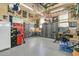 Organized garage with storage cabinets, tool chests, and ample workspace at 1828 S James Gregarie Rd, Mount Pleasant, SC 29466