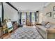 Bright living room with a movie projector and lots of natural light at 1828 S James Gregarie Rd, Mount Pleasant, SC 29466
