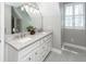 Bathroom featuring double sinks with a white marble countertop at 2001 Baltusrol Ct, Summerville, SC 29483
