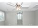 Neutral bedroom featuring a ceiling fan, carpet flooring, and bright light at 2001 Baltusrol Ct, Summerville, SC 29483