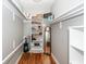 Walk-in closet with custom shelving offers ample storage space for clothes and accessories at 2001 Baltusrol Ct, Summerville, SC 29483