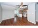 Open living room with hardwood floors with access to the kitchen at 2001 Baltusrol Ct, Summerville, SC 29483