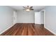 Spacious, open living room with hardwood floors and multiple entryways at 2001 Baltusrol Ct, Summerville, SC 29483