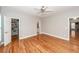 Spacious main bedroom featuring hardwood floors, ample closet space, and neutral color scheme at 2001 Baltusrol Ct, Summerville, SC 29483