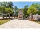 Enjoy outdoor living with this brick fireplace and stone patio, perfect for entertaining guests at 2001 Baltusrol Ct, Summerville, SC 29483