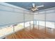Bright sunroom with hardwood floors and oversized windows at 2001 Baltusrol Ct, Summerville, SC 29483