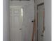 Hallway with two doors showcases the layout of the home's interior at 202 Easy, Goose Creek, SC 29445