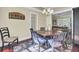 Traditional dining room with hardwood floors, round table and chairs, and stylish decor at 2021 Beckton St, North Charleston, SC 29420