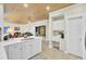 Spacious kitchen features white cabinets, a desk, and a seamless layout with the living area at 2021 Beckton St, North Charleston, SC 29420
